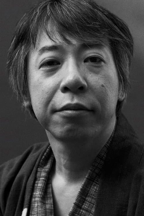 A portrait of Toshiaki Toyoda