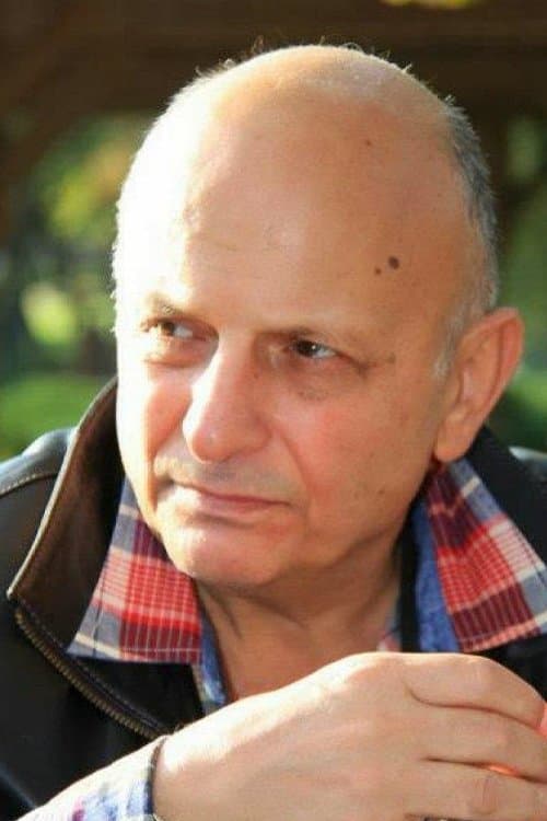 A portrait of Ümit Efekan