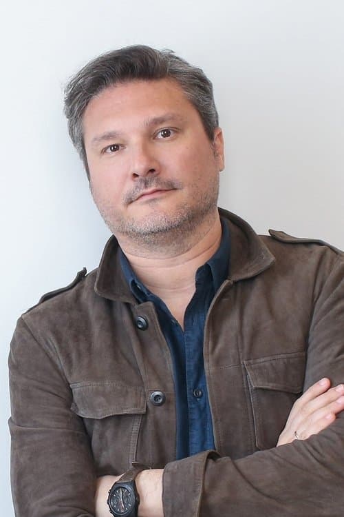 A portrait of Umut Aral