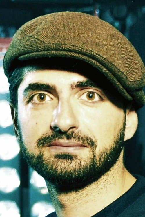 A portrait of Umut Dağ