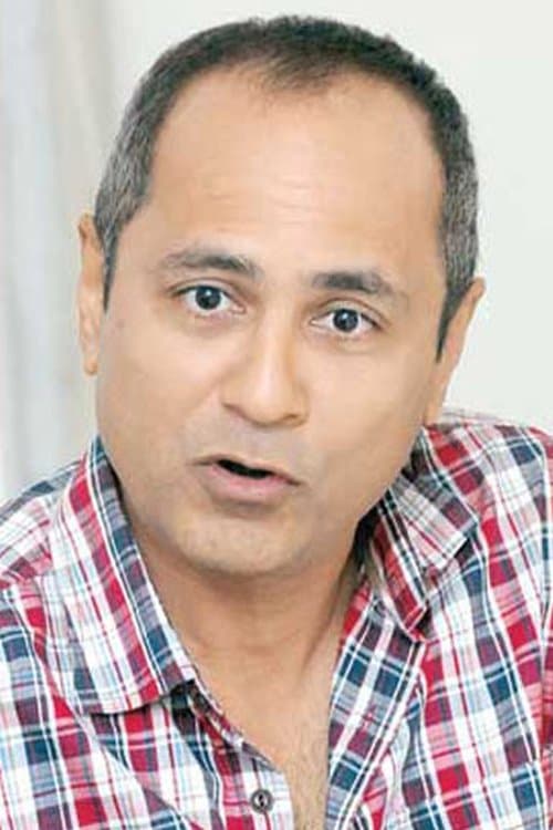 A portrait of Vipul Amrutlal Shah