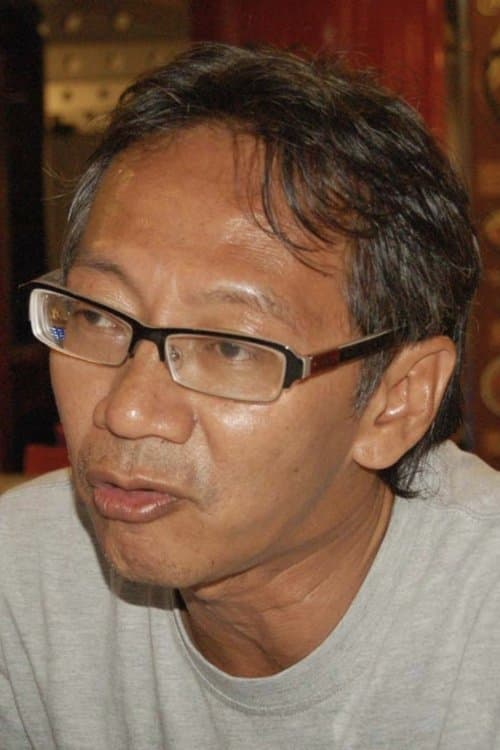A portrait of Yadi Sugandi